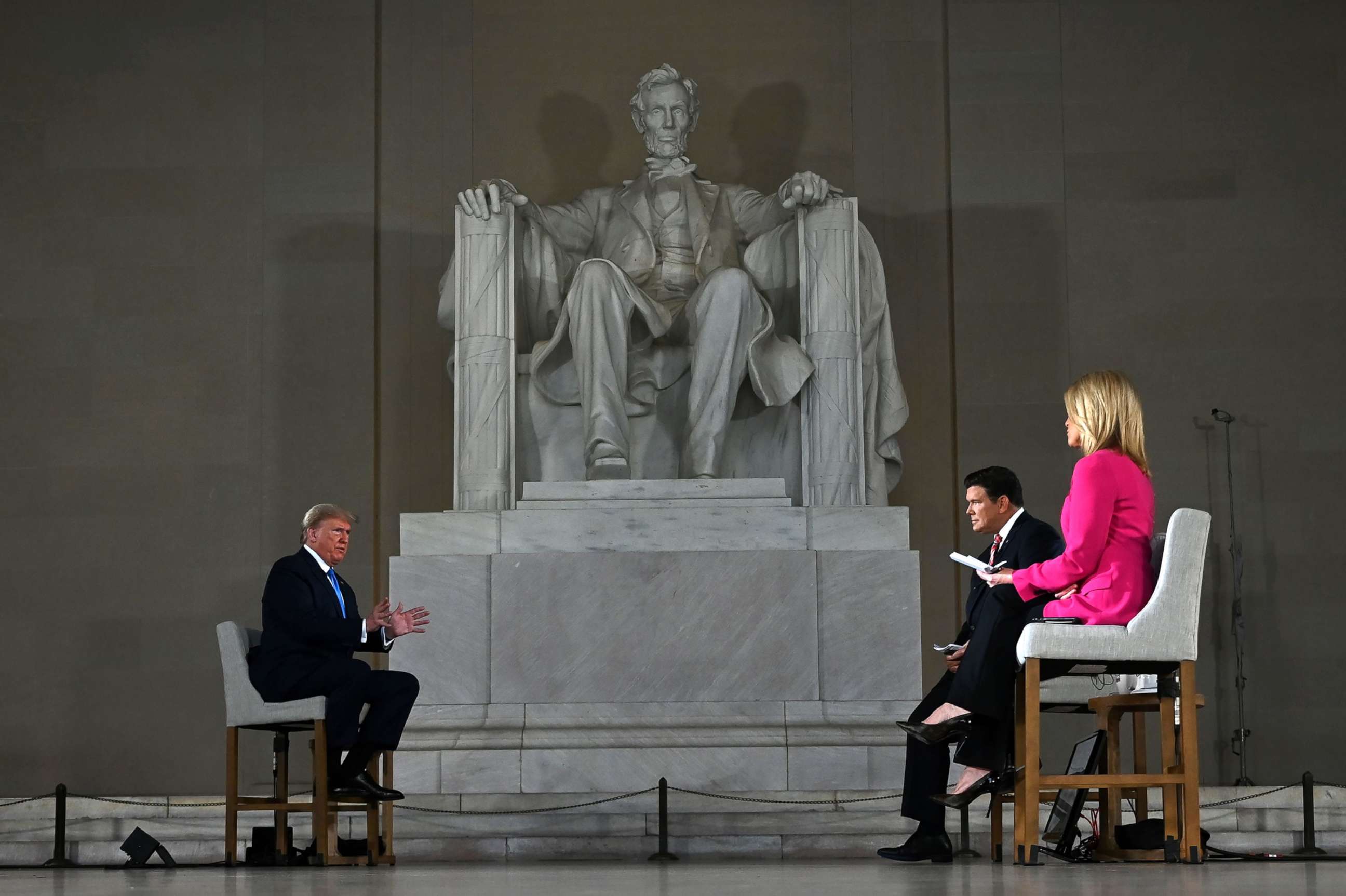 PHOTO: President Donald Trump speaks during a Fox News virtual town hall "America Together: Returning to Work," event, with anchors Bret Baier and Martha MacCallum, from the Lincoln Memorial in Washington, D.C., on May 3, 2020.