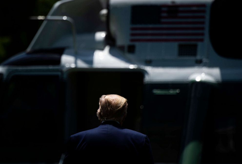 PHOTO: President Donald Trump walks to Marine One after speaking to the press before departing the White House, on May 30, 2020, in Washington, DC.