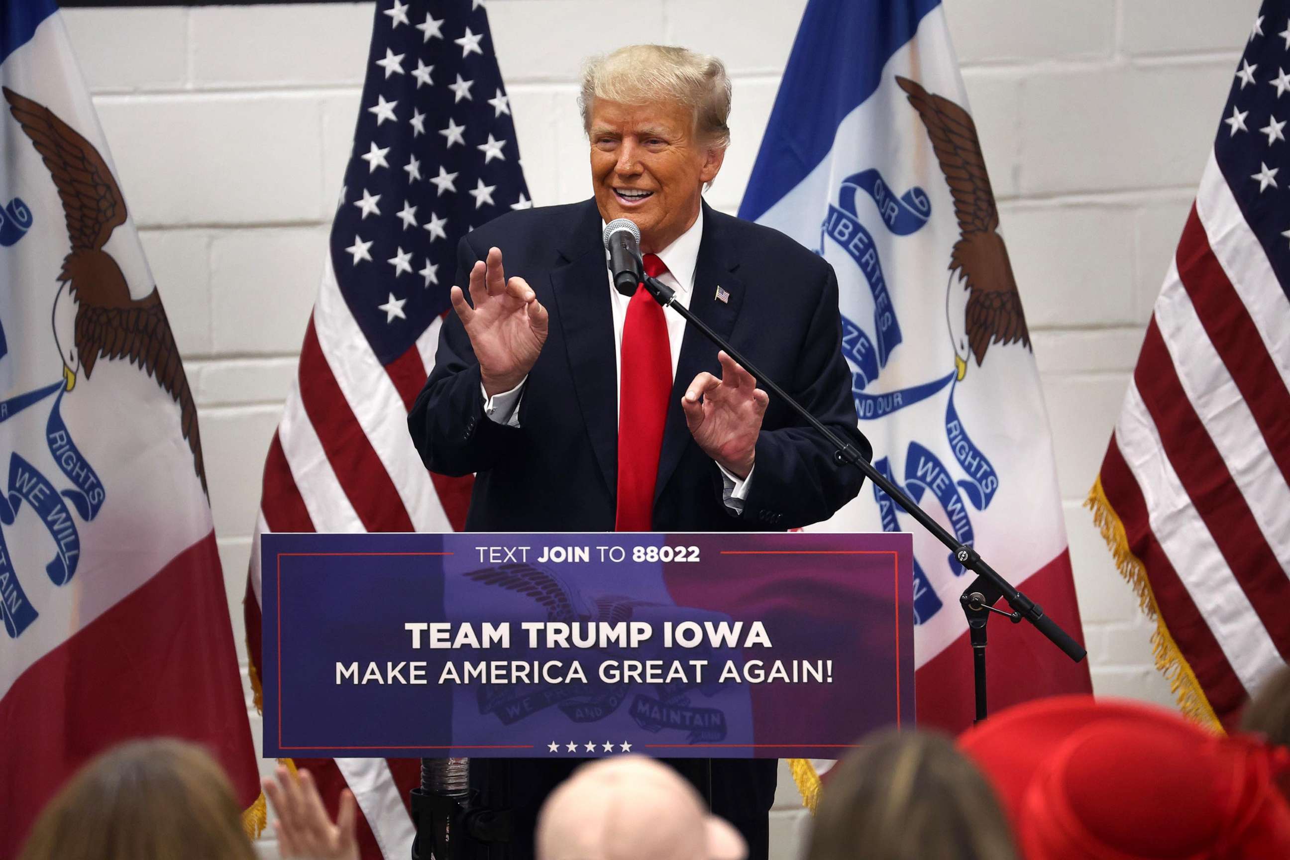 PHOTO: Former President Donald Trump greets supporters at a Team Trump volunteer leadership training event held at the Grimes Community Complex on June 1, 2023, in Grimes, Iowa.