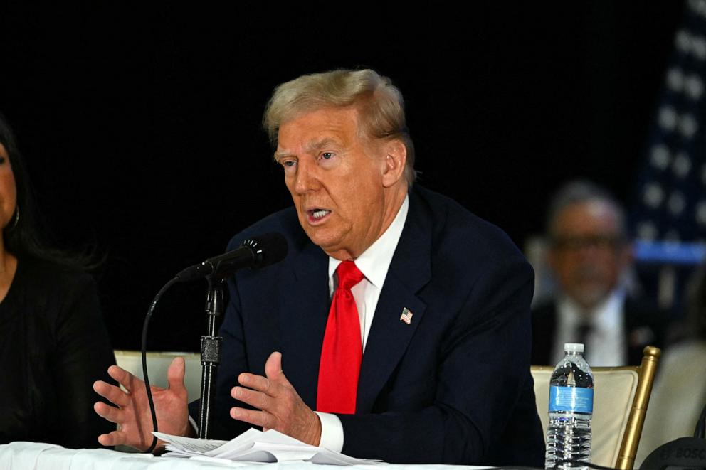 PHOTO: Former US President and Republican presidential candidate Donald Trump speaks during a roundtable discussion with Latino community leaders at Trump National Doral Miami resort in Miami, on Oct. 22, 2024.