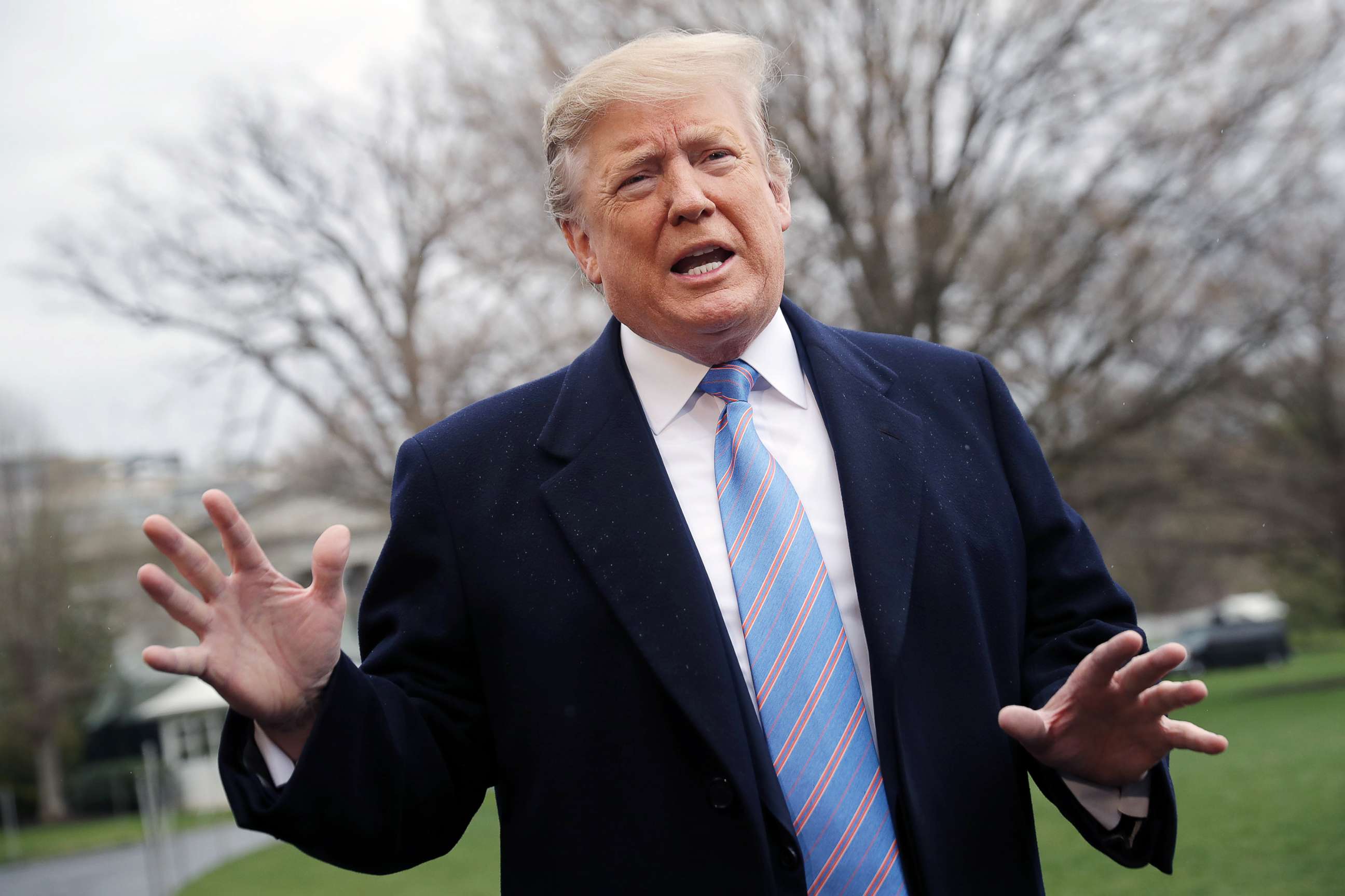 PHOTO: President Donald Trump talks to reporters as he leaves the White House, April 5, 2019.