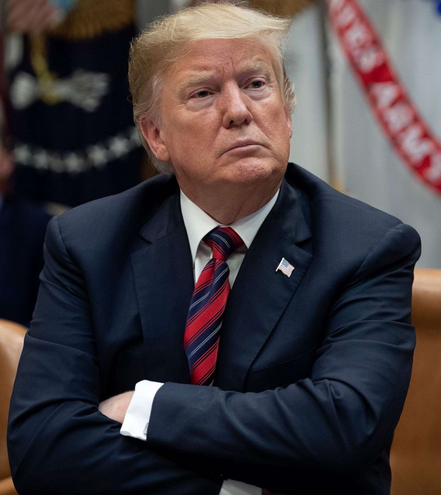 PHOTO: President Donald Trump listens during a meeting in the Roosevelt Room of the White House, March 13, 2019.