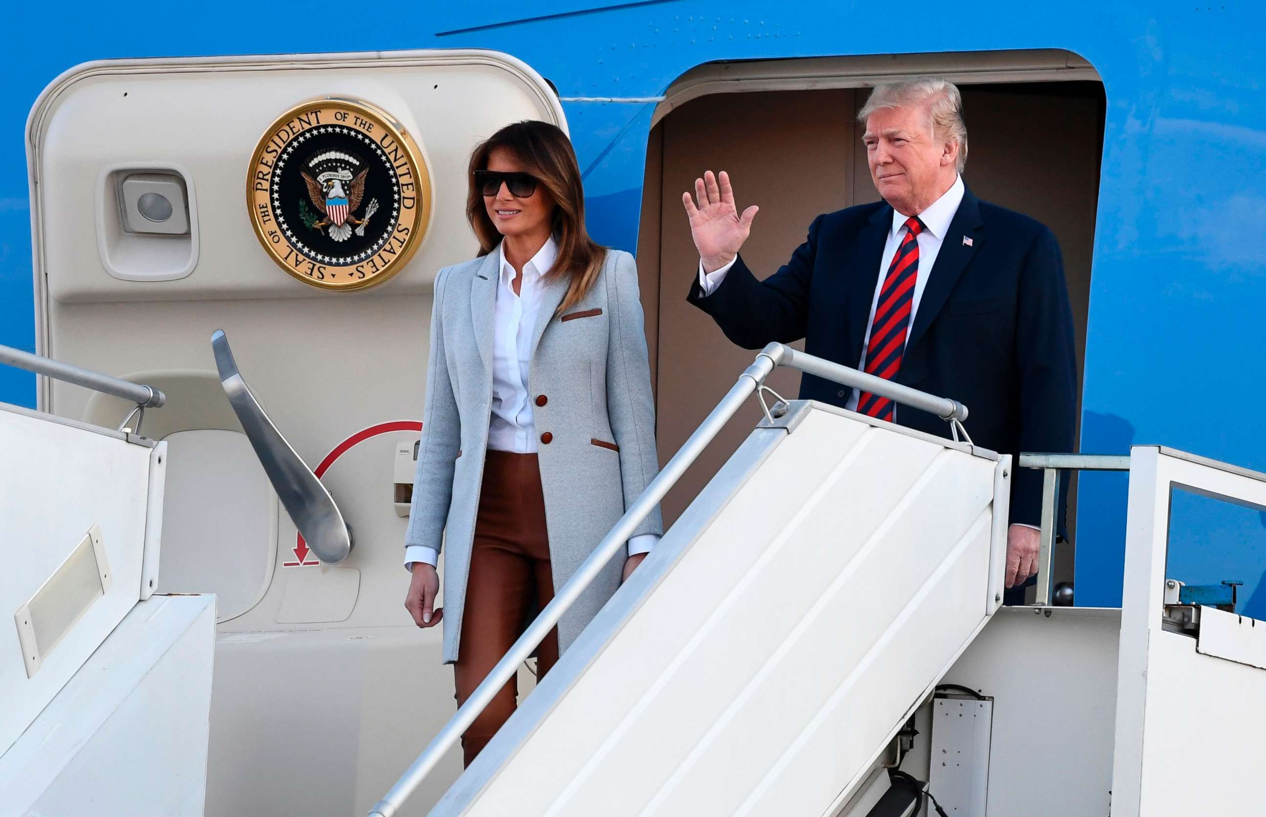 PHOTO: President Donald Trump and First Lady Melania Trump disembark from Air Force One upon arrival at Helsinki-Vantaa Airport in Helsinki, July 15, 2018, on the eve of a summit in Helsinki between the US President and his Russian counterpart.