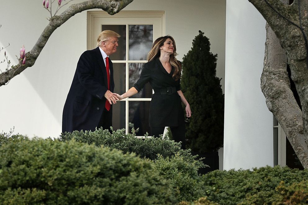 PHOTO: President Donald Trump shakes hands with Communications Director Hope Hicks on her last day of work at the White House before he departs, March 29, 2018, in Washington.