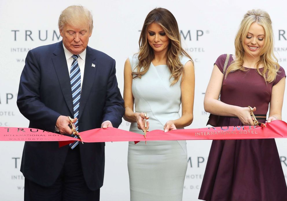 PHOTO: File photo of then Republican presidential nominee Donald Trump, left, his wife Melania Trump and daughter Tiffany Trump cutting the ribbon at the new Trump International Hotel on Oct. 26, 2016, in Washington.