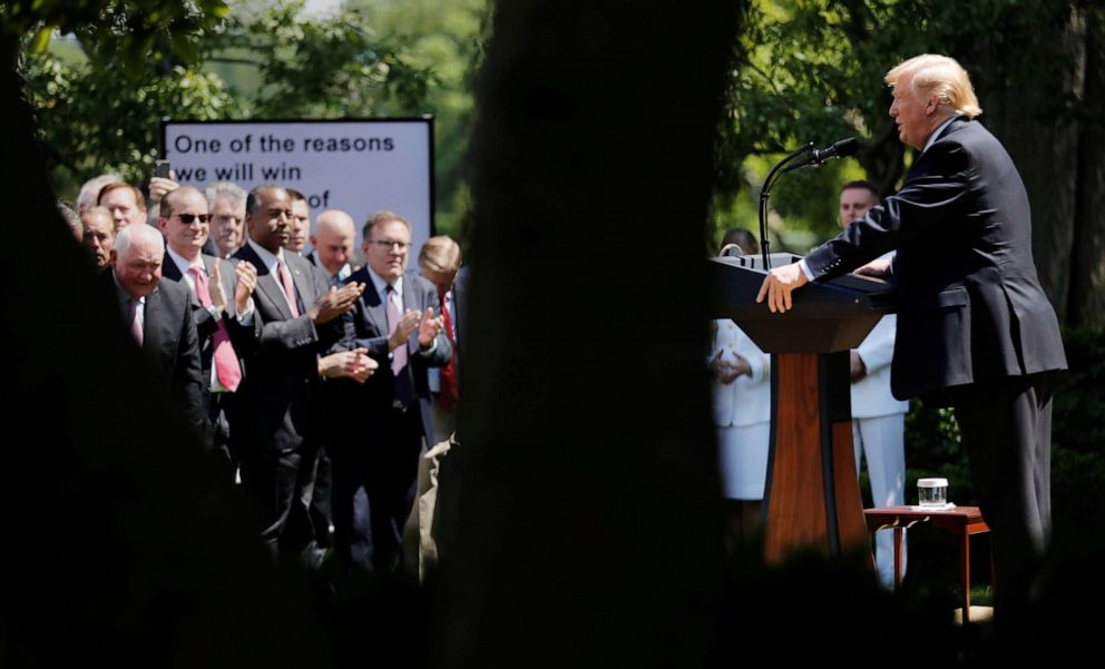 PHOTO: President Donald Trump speaks about his administration's proposals to change U.S. immigration policy as members of his cabinet applaud in the Rose Garden of the White House, May 16, 2019.
