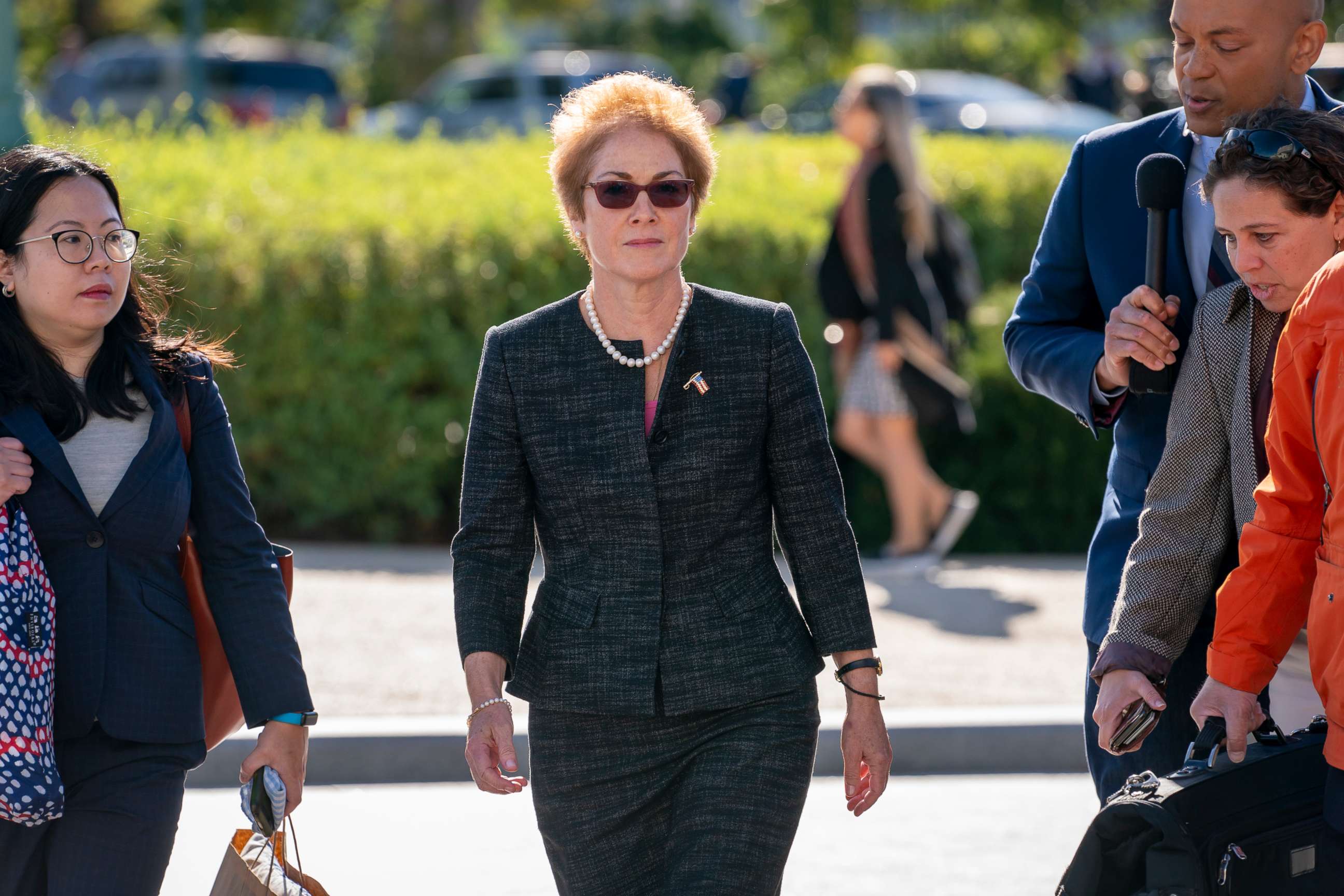 PHOTO: Former U.S. ambassador to Ukraine Marie Yovanovitch, center, arrives on Capitol Hill, Friday, Oct. 11, 2019, in Washington.