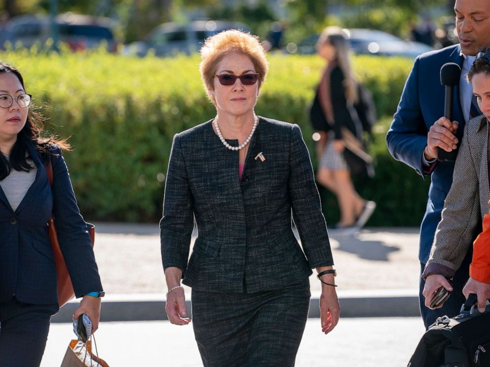 PHOTO: Former U.S. ambassador to Ukraine Marie Yovanovitch, center, arrives on Capitol Hill, Friday, Oct. 11, 2019, in Washington.