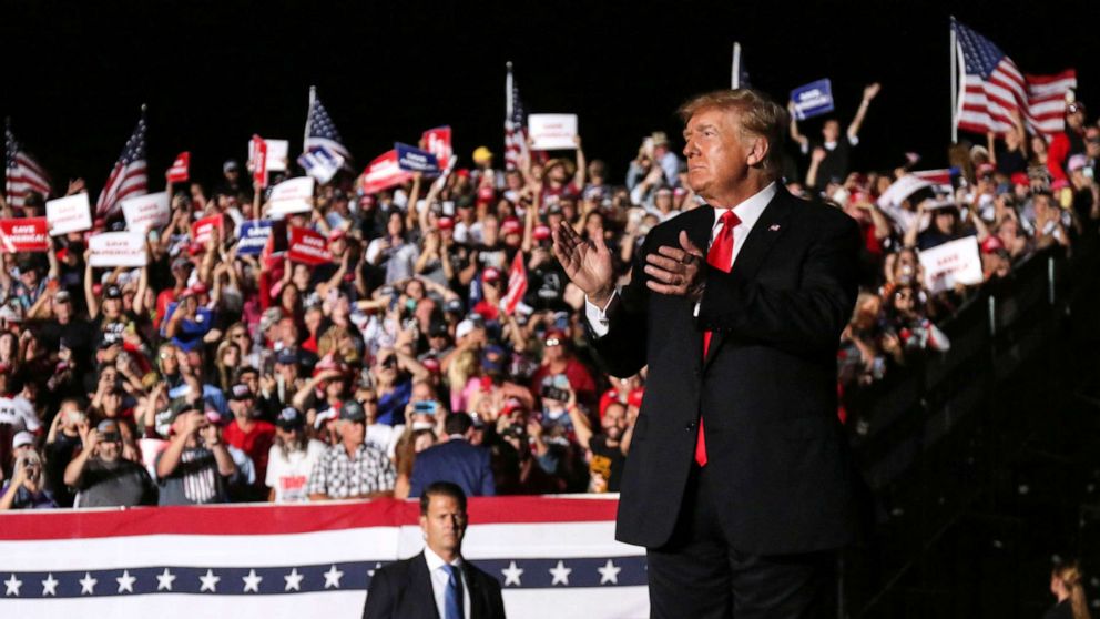 PHOTO: In this Oct. 9, 2021, file photo, former President Donald Trump applauds after his speech during a rally at the Iowa States Fairgrounds in Des Moines, Iowa.