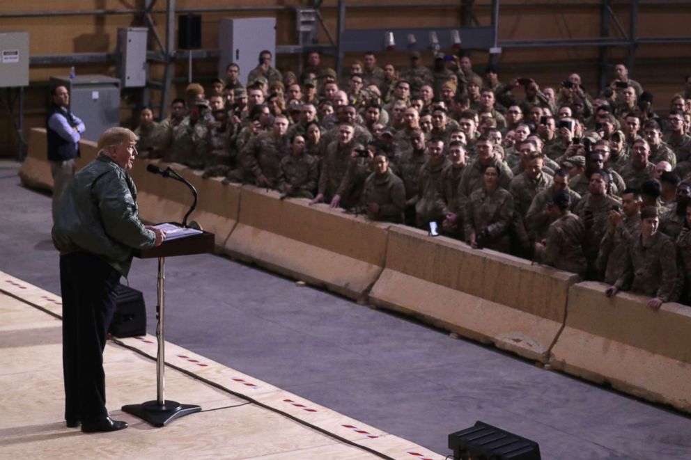 PHOTO: President Donald Trump delivers remarks to U.S. troops in an unannounced visit to Al Asad Air Base, Iraq, Dec. 26, 2018.