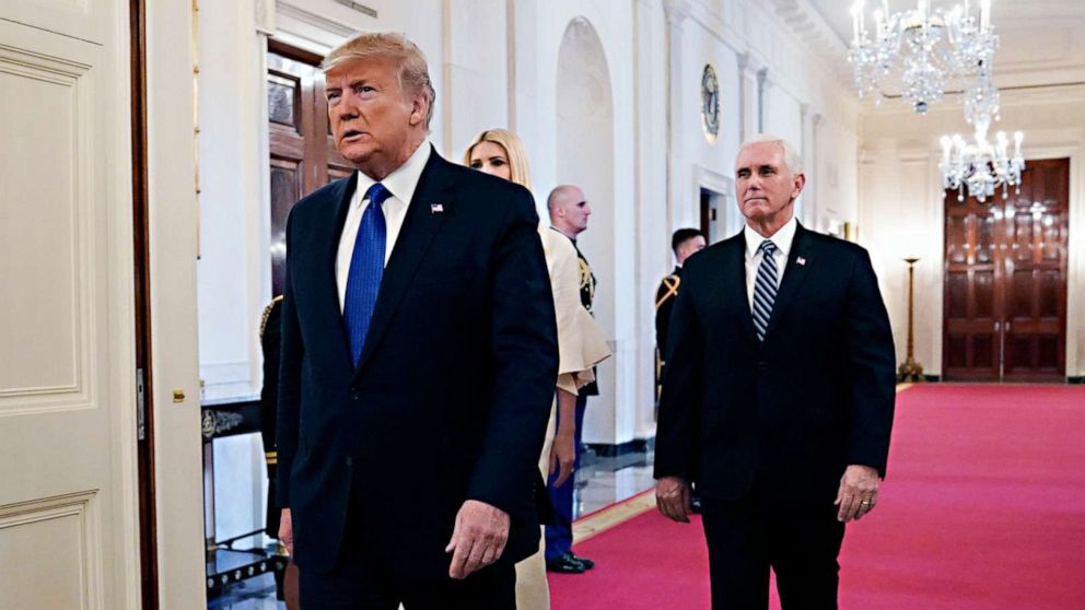 PHOTO: President Donald Trump arrives to speak during an event on human trafficking in the East Room of the White House on Jan. 31, 2020 in Washington, followed by Vice President Mike Pence, right, and senior adviser to the President, Ivanka Trump.