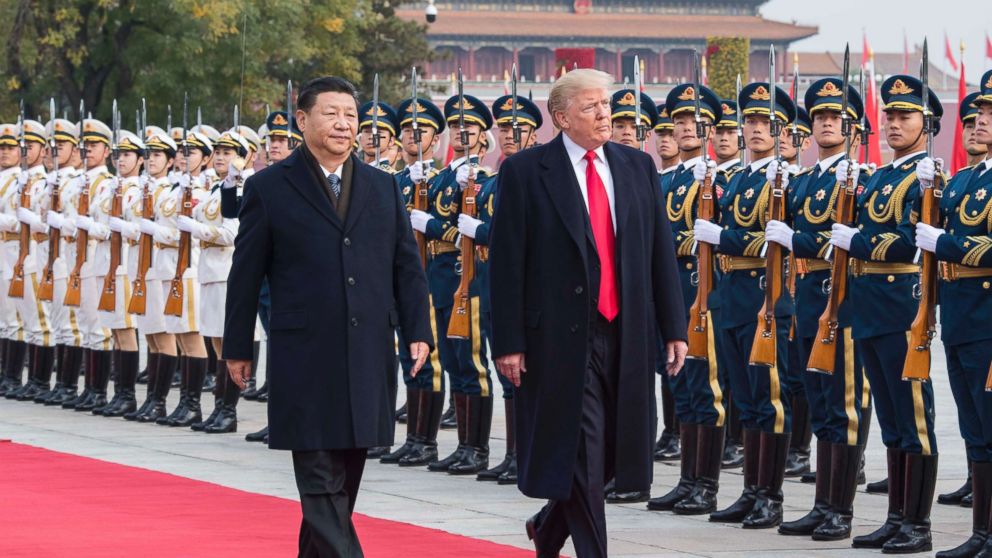 Chinese President Xi Jinping holds a grand ceremony to welcome President Donald Trump at the square outside the east gate of the Great Hall of the People, in Beijing, Nov. 9, 2017. 