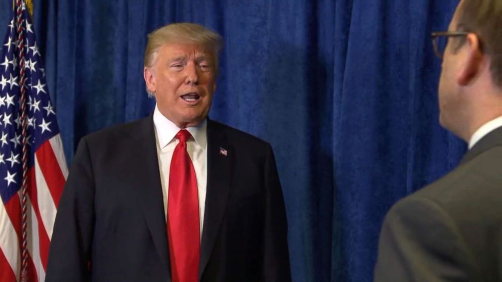 PHOTO: President Donald Trump speaks with ABC News' Jonathan Karl before a campaign rally in Fort Myers, Fla., Oct. 31, 2018.