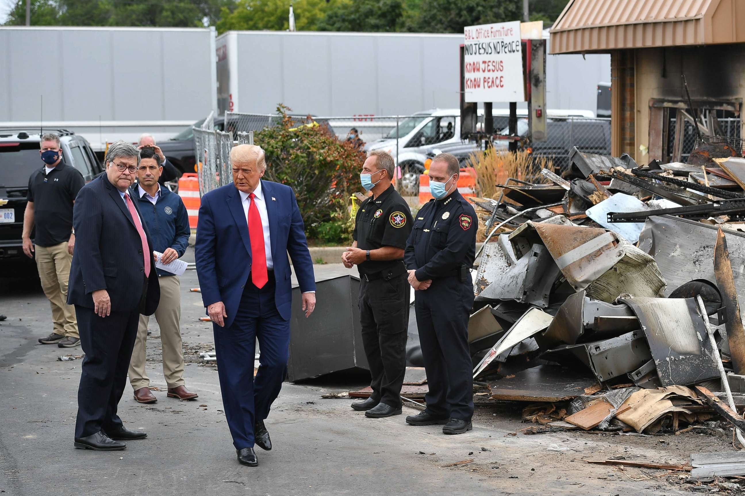 PHOTO: President Donald Trump, with Attorney General William Barr and Acting Homeland Security Secretary Chad Wolf, tours an area affected by civil unrest in Kenosha, Wisconsin, Sept. 1, 2020.