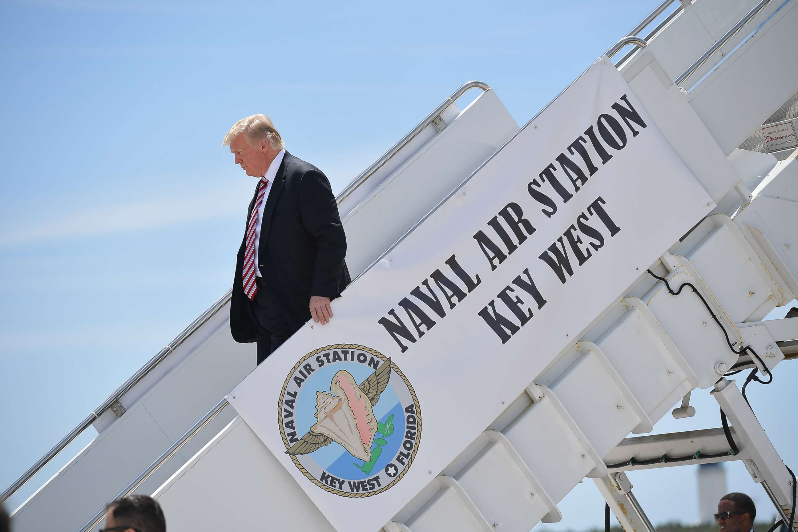 PHOTO: President Donald Trump steps off Air Force One upon arrival at Naval Air Station Key West in Key West, Fla., April 19, 2018.