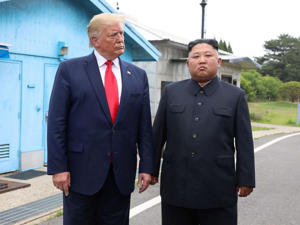 PHOTO: President Donald Trum and North Korean leader Kim Jong Un meet in the demilitarized zone (DMZ) separating the South and North Korea on June 30, 2019 in Panmunjom, South Korea.