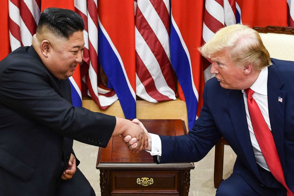 PHOTO: North Korea's leader Kim Jong Un and President Donald Trump shake hands during a meeting near the Military Demarcation Line dividing North and South Korea, in the Joint Security Area (JSA) of Panmunjom in the Demilitarized zone, on June 30, 2019.