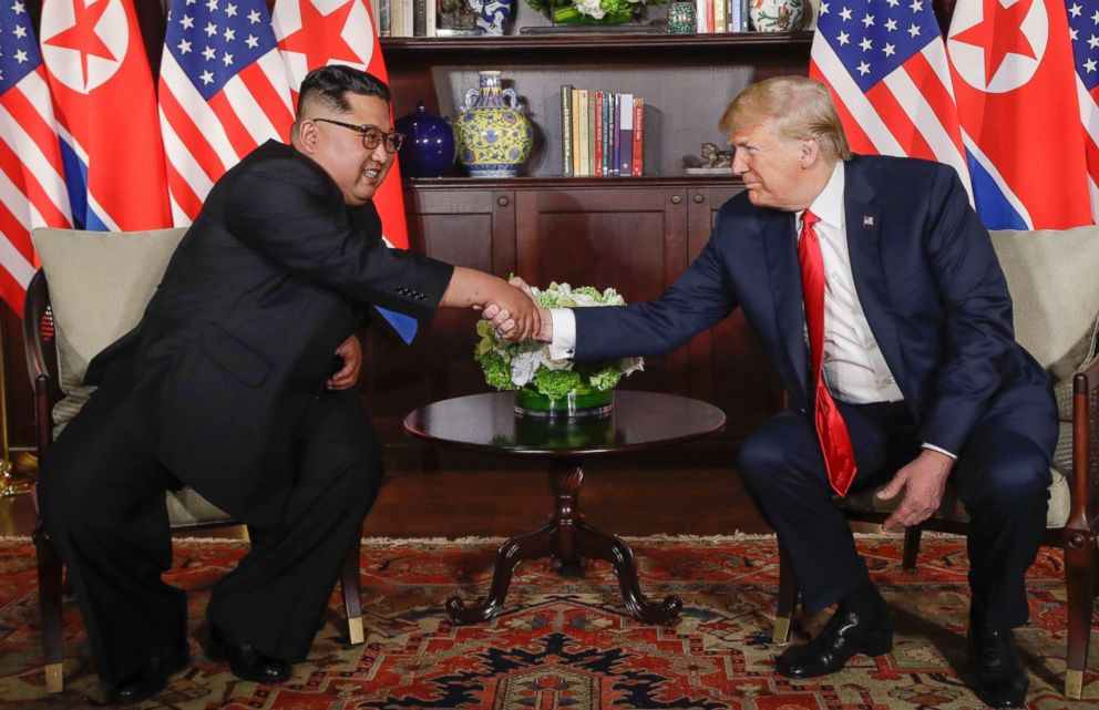 PHOTO: President Donald Trump shakes hands with North Korea leader Kim Jong Un during their first meetings, June 12, 2018 in Singapore.