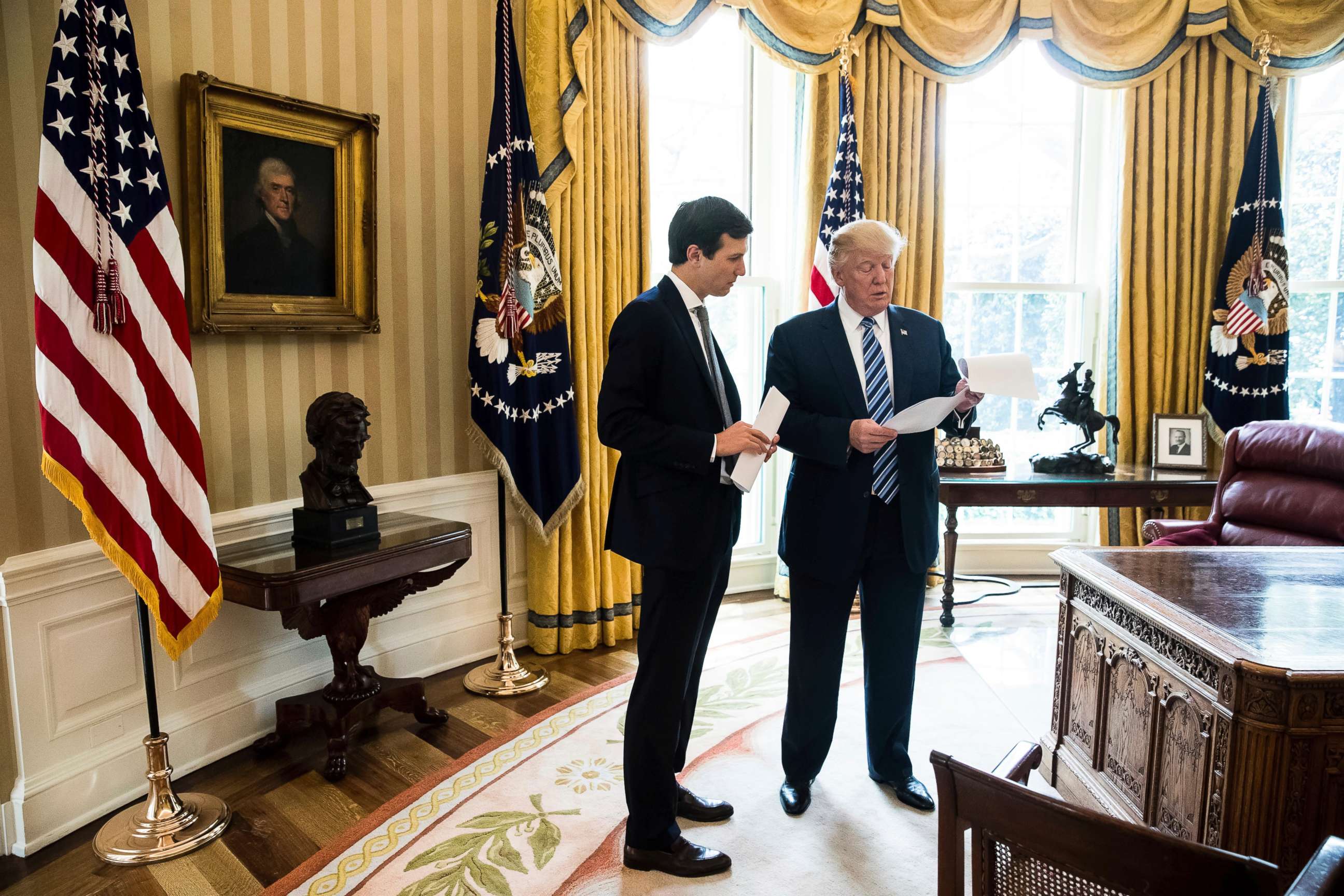 PHOTO: President Donald Trump speaks to White House Senior Adviser Jared Kushner, left, in the Oval Office in Washington, D.C., April 21, 2017. 