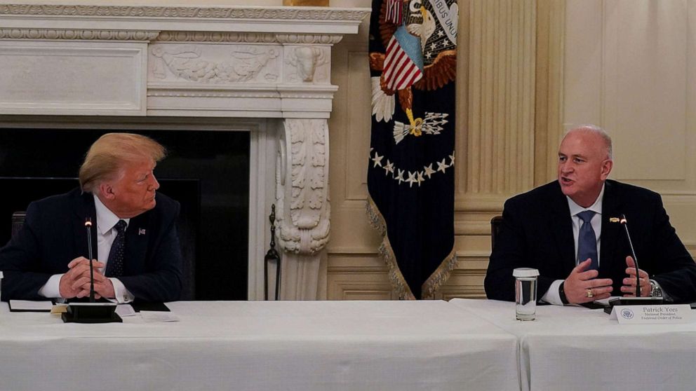 PHOTO: President Donald Trump listens to Fraternal Order of Police National President Patrick Yoes during a roundtable discussion with law enforcement at the White House in Washington, June 8, 2020.