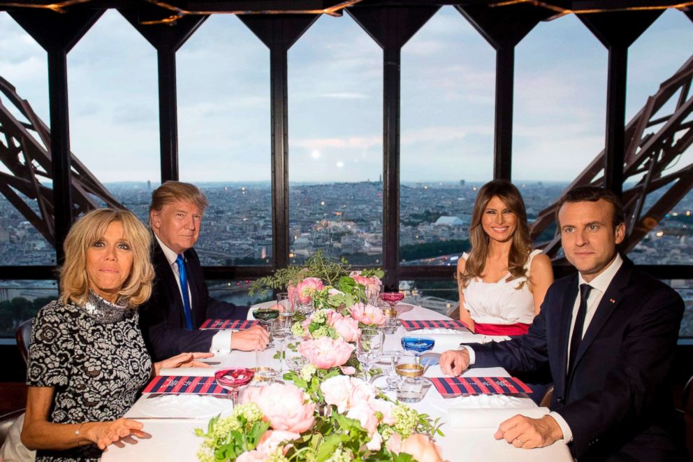 PHOTO: Emmanuel Macron, Brigitte Macron, Donald Trump and First Lady Melania Trump attend a dinner at Le Jules Verne Restaurant on the Eiffel Tower in Paris, on July 13, 2017.