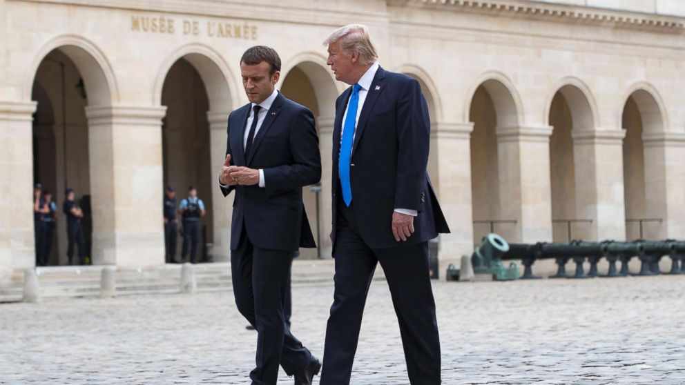 PHOTO: French President Emmanuel Macron walks with President Donald J. Trump as they leave Les Invalides museum in Paris, July 13, 2017. President Donald Trump is on a two-day visit in Paris. 