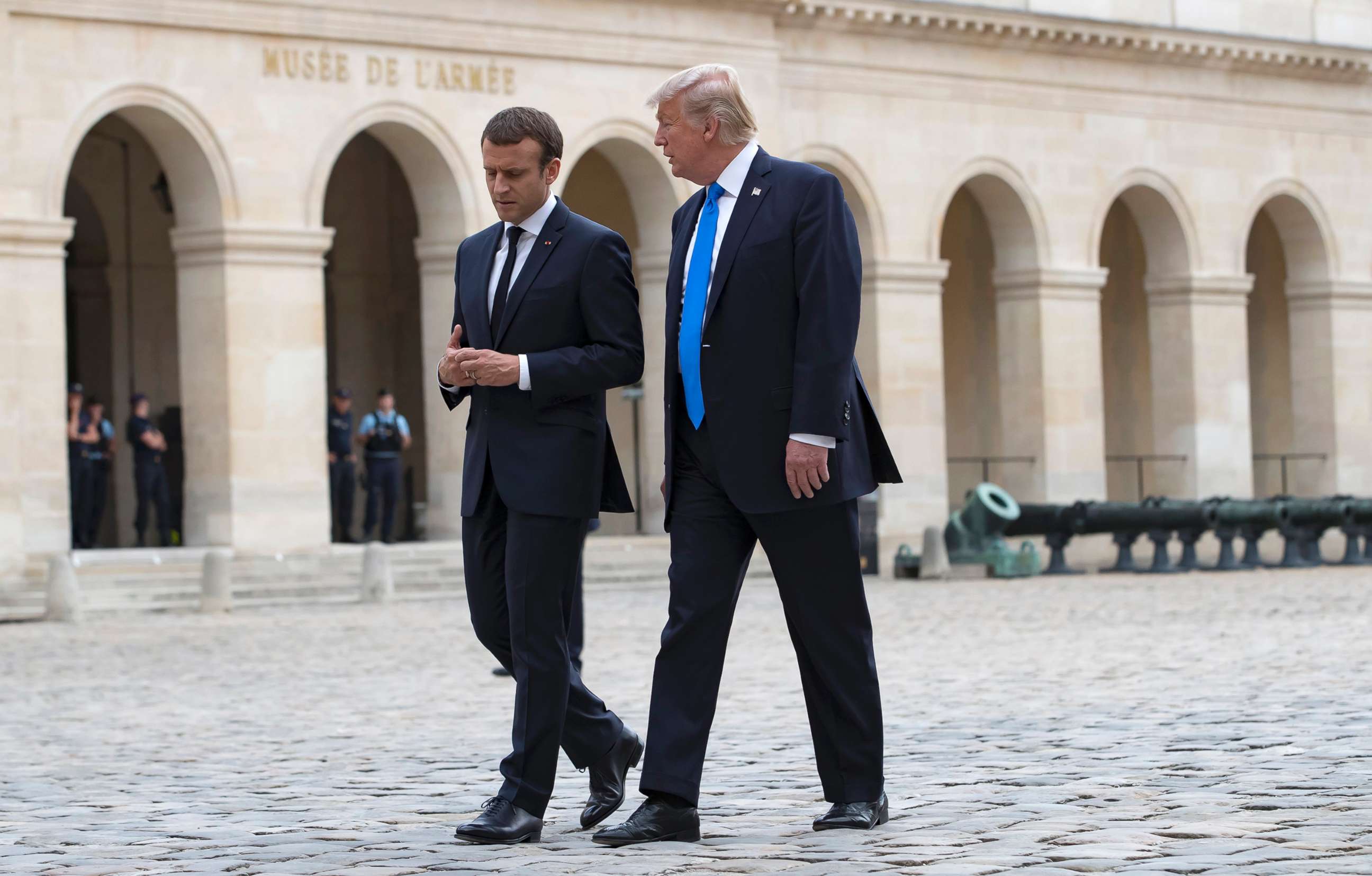 PHOTO: French President Emmanuel Macron walks with President Donald J. Trump as they leave Les Invalides museum in Paris, July 13, 2017. 