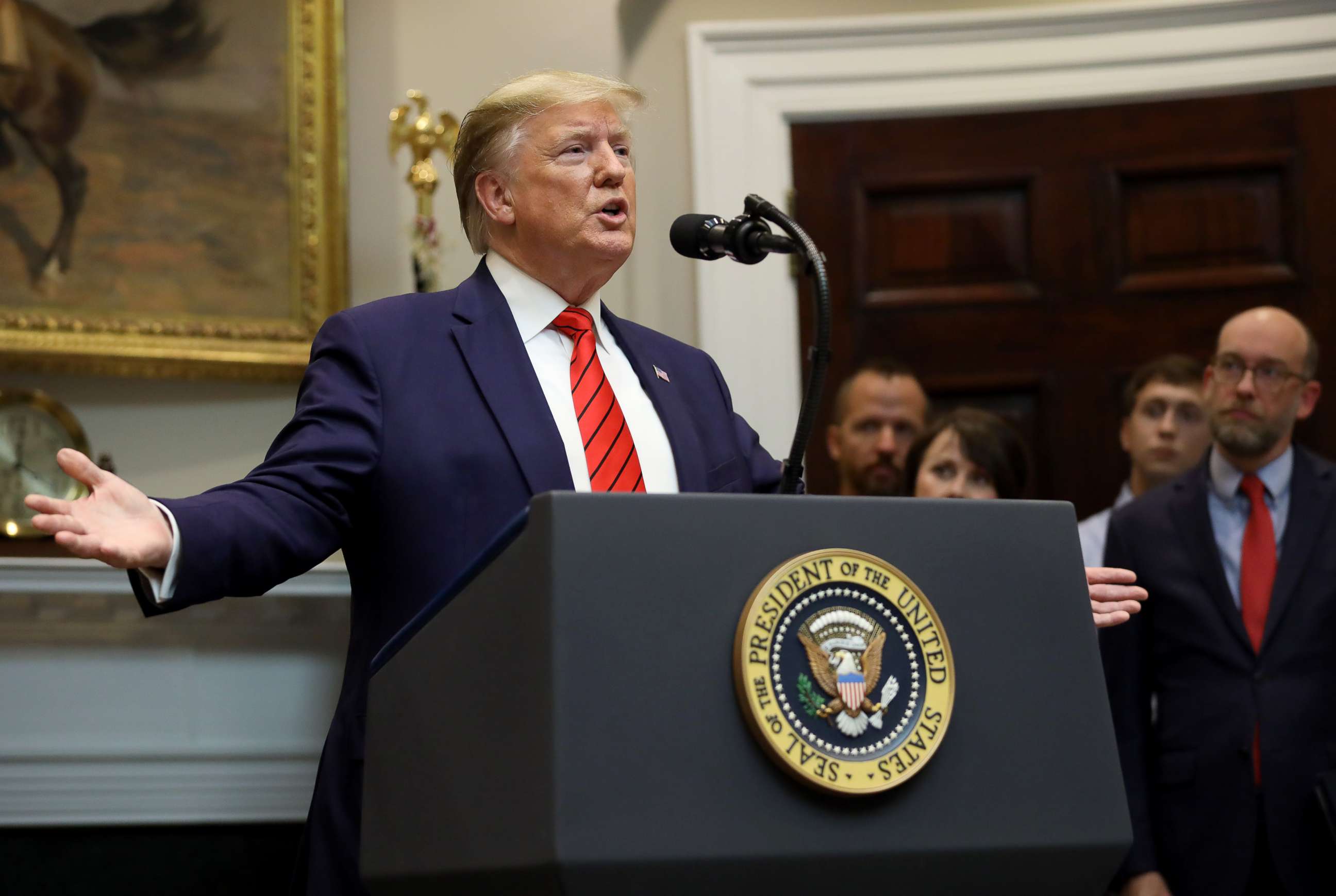 PHOTO: U.S. President Donald Trump responds to a question from a reporter at an event for the signing of two executive orders aimed at greater governmental transparency at the White House Oct. 9, 2019 in Washington, D.C.