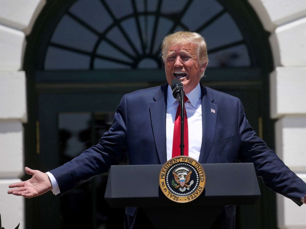 PHOTO: President Donald Trump answers questions from the media during an event on the South Lawn of the White House, July 15, 2019.
