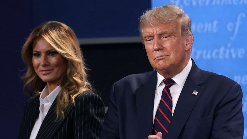 PHOTO: President Donald Trump and first lady Melania Trump on stage after the first presidential debate between Trump and Democratic presidential nominee Joe Biden, Sept. 29, 2020, in Cleveland.