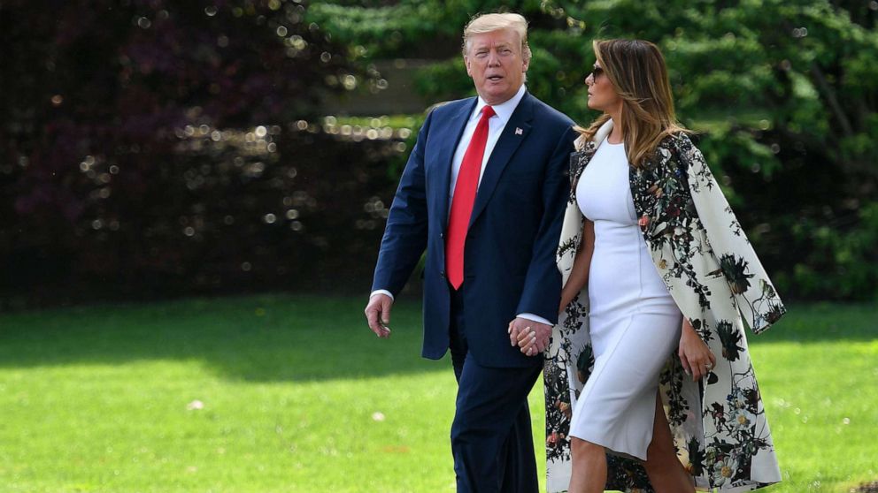 PHOTO: President Donald Trump and first lady Melania Trump walk together to board Marine One from the South Lawn of the White House in Washington, D.C., on April 18, 2019.