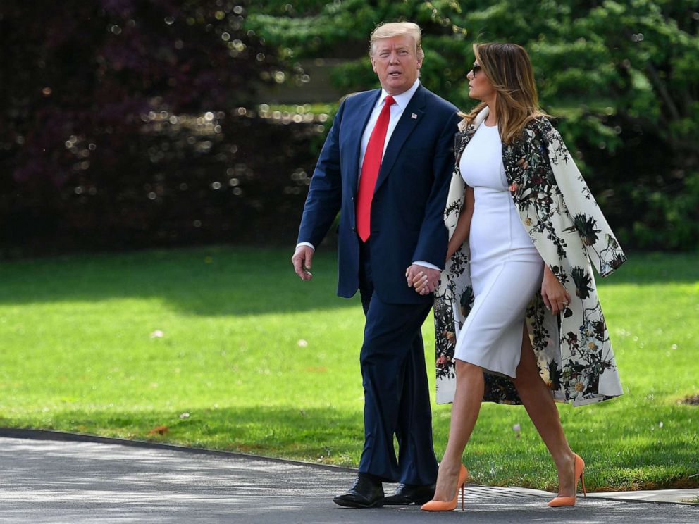 PHOTO: President Donald Trump and first lady Melania Trump walk together to board Marine One from the South Lawn of the White House in Washington, D.C., on April 18, 2019.