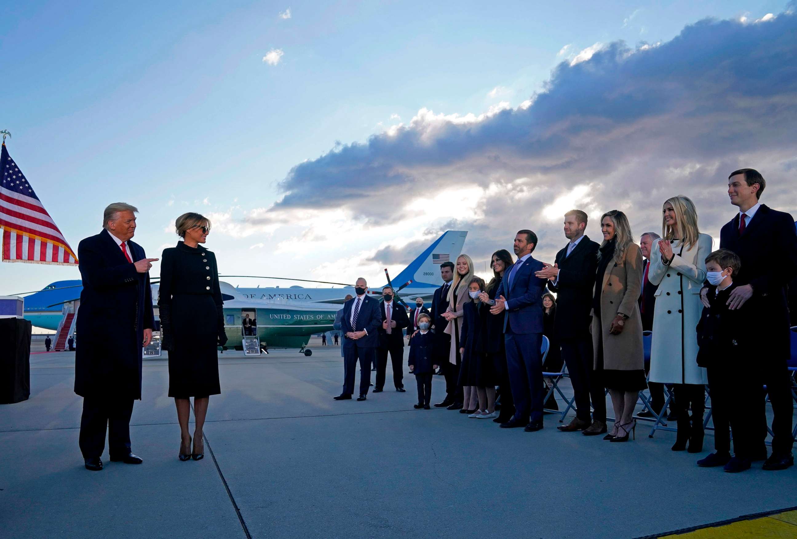 PHOTO: President Donald Trump and First Lady Melania are greeted by their family members on the tarmac at Joint Base Andrews in Maryland, Jan. 20, 2021, after departing the White House.
