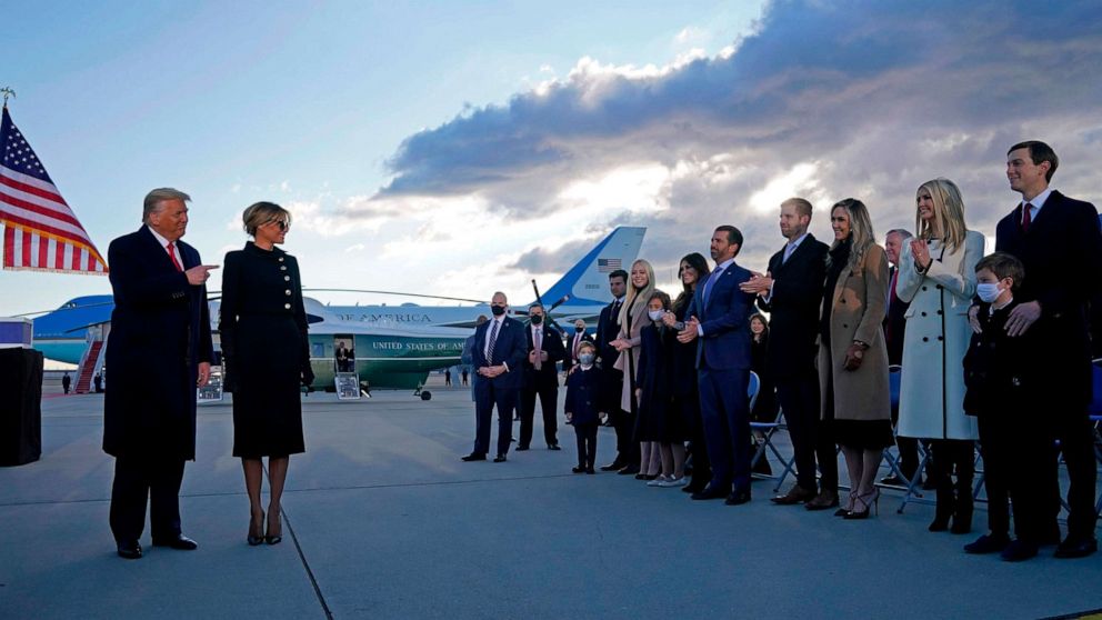 PHOTO: President Donald Trump and First Lady Melania are greeted by their family members on the tarmac at Joint Base Andrews in Maryland, Jan. 20, 2021, after departing the White House.