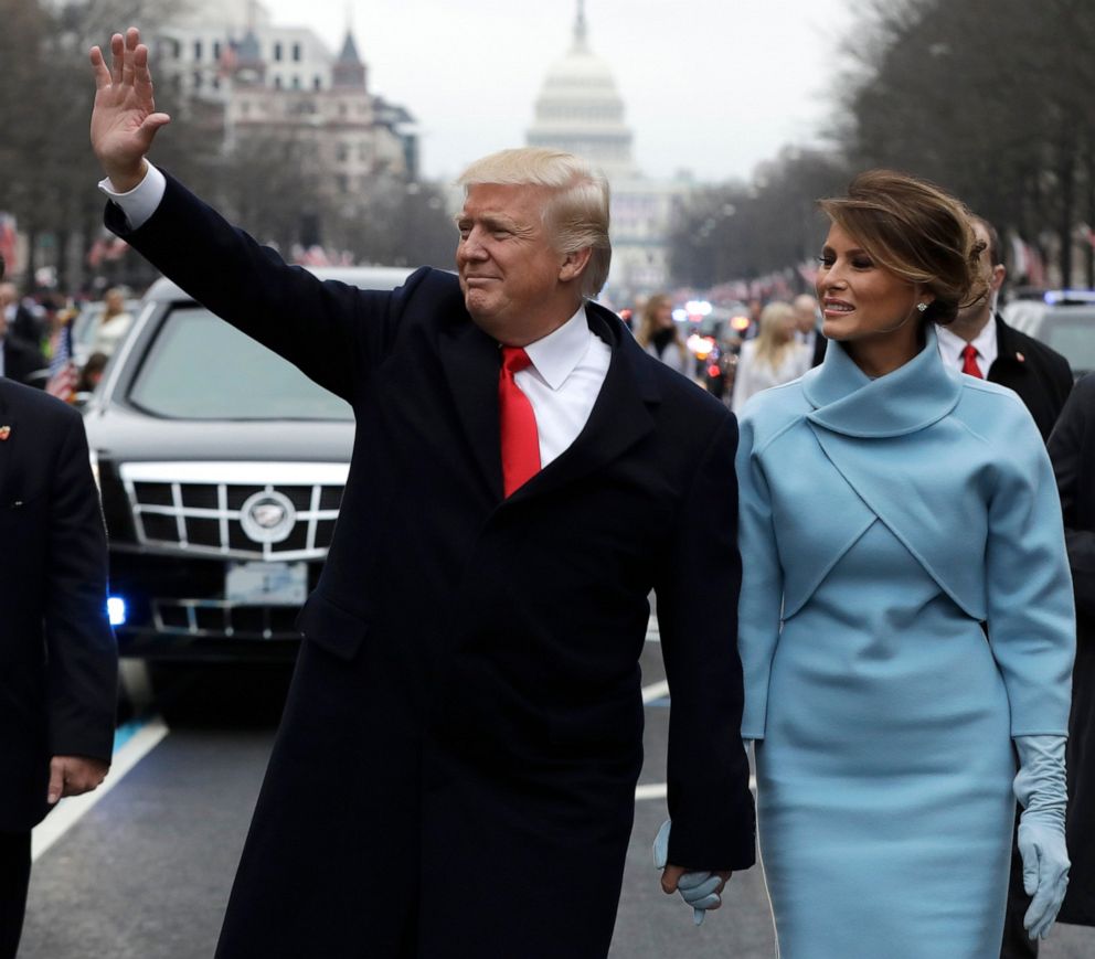 PHOTO: In this Jan. 20, 2017 file photo, President Donald Trump waves as he walks with first lady Melania Trump during the inauguration parade on Pennsylvania Avenue in Washington.