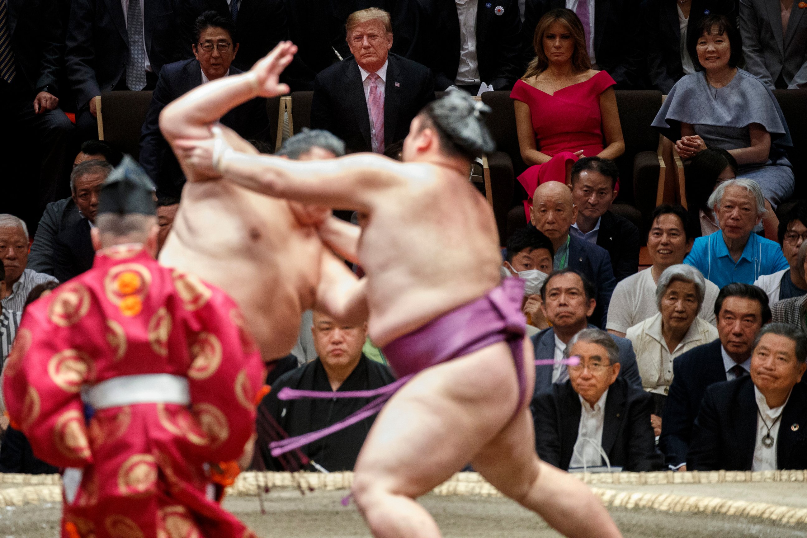PHOTO: President Donald Trump attends the Tokyo Grand Sumo Tournament with Japanese Prime Minister Shinzo Abe at Ryogoku Kokugikan Stadium, Sunday, May 26, 2019, in Tokyo. At top right is Akie Abe and second from right is first lady Melania Trump.