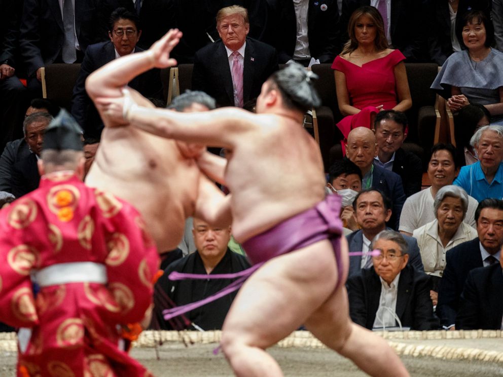 PHOTO: President Donald Trump attends the Tokyo Grand Sumo Tournament with Japanese Prime Minister Shinzo Abe at Ryogoku Kokugikan Stadium, Sunday, May 26, 2019, in Tokyo. At top right is Akie Abe and second from right is first lady Melania Trump.