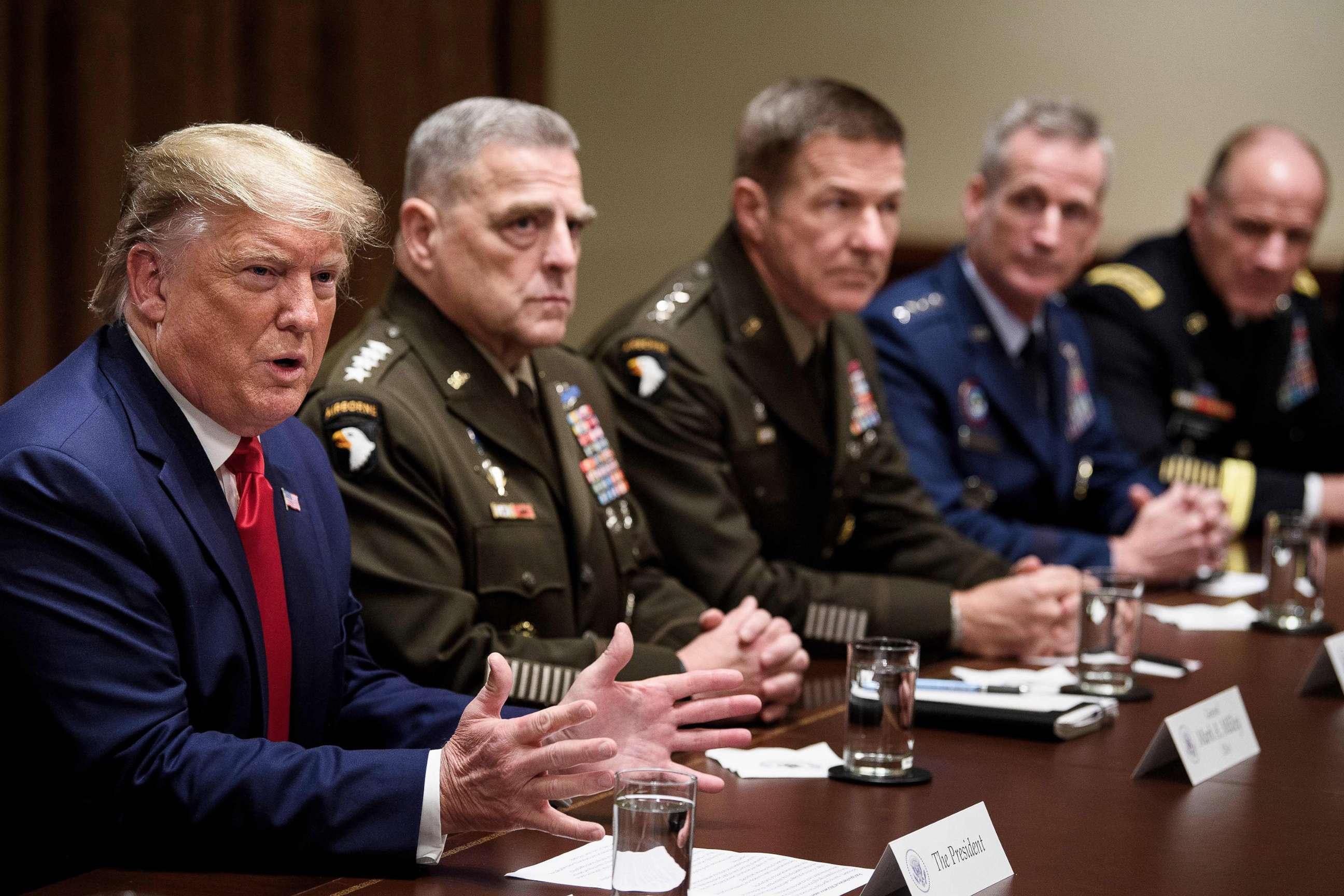 PHOTO: President Donald Trump speaks during a meeting with senior military leaders including Chairman of the Joint Chiefs of Staff Army General Mark A. Milley, seated next to Trump, in the Cabinet Room of the White House Oct. 7, 2019.