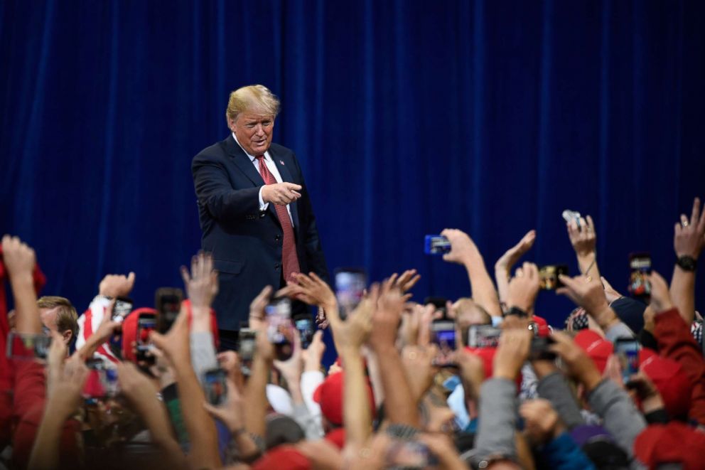 PHOTO: President Donald Trump walks to the stage at a campaign rally, Oct. 4, 2018 at Mayo Civic Center in Rochester, Minn. 