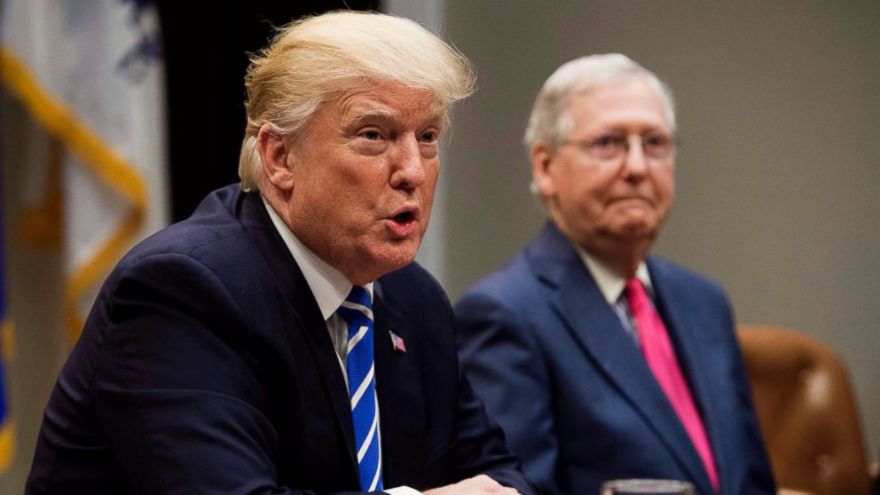 President Donald Trump speaks alongside Senate Majority Leader Mitch McConnell as they hold a meeting about tax reform in the Roosevelt Room of the White House in Washington, Sept. 5, 2017.