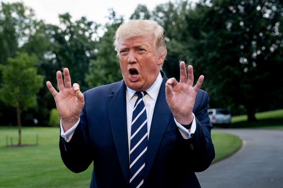 PHOTO: President Donald Trump speaks to reporters before boarding Marine One at the White House, in Washington, on July 19, 2019.