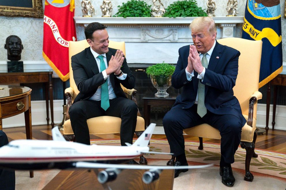PHOTO: President Donald Trump and Irish Prime Minister Leo Varadkar joke about not shaking hands during a meeting in the Oval Office of the White House, March 12, 2020.