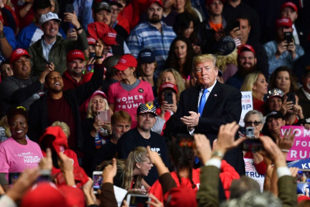 PHOTO: President Donald Trump claps during a "Make America Great Again" rally at Bojangles' Coliseum, Oct. 26, 2018, in Charlotte, North Carolina.