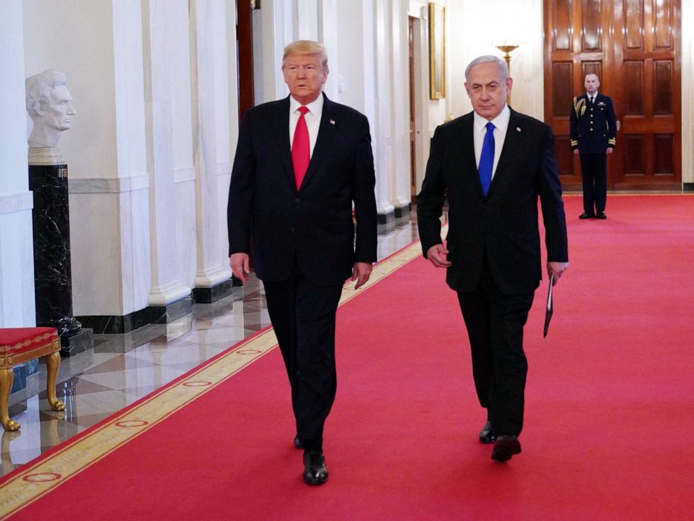 PHOTO: President Donald Trump and Israeli Prime Minister Benjamin Netanyahu arrive for an announcement of Trump's Middle East peace plan in the East Room of the White House in Washington, D.C on Jan. 28, 2020.