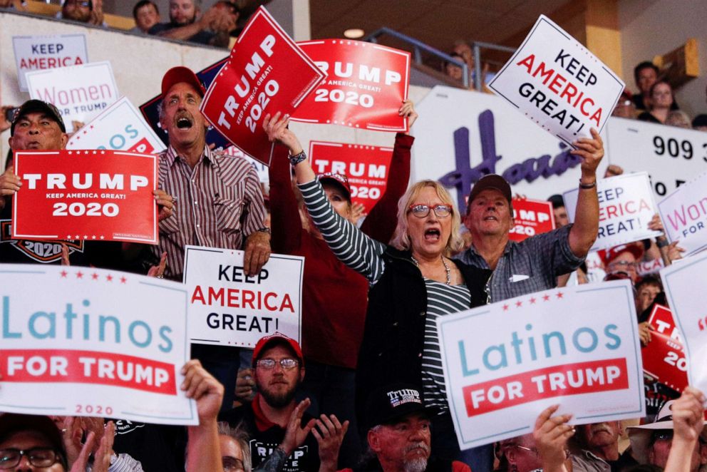 PHOTO: Members of the audience look on as President Donald Trump delivers remarks at a Keep America Great rally at the Santa Ana Star Center in Rio Rancho, New Mexico, on Monday, Sept. 16, 2019.