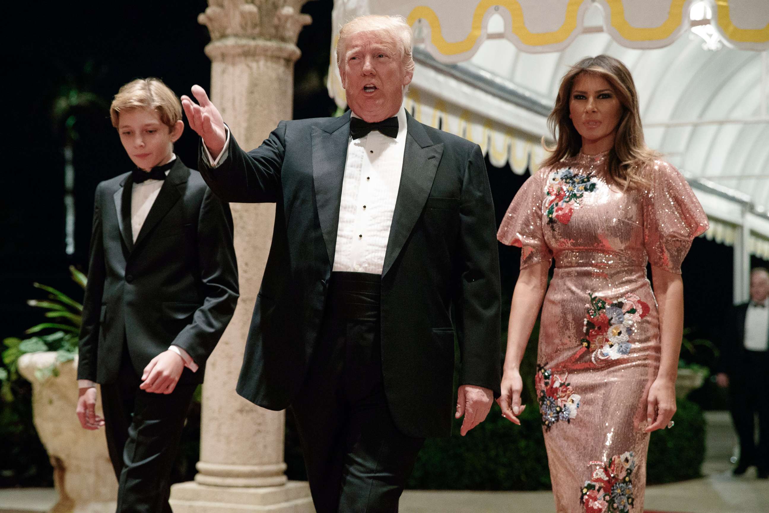 PHOTO: President Donald Trump, first lady Melania Trump, and their son Barron arrive for a New Year's Eve gala at his Mar-a-Lago resort , Dec. 31, 2017, in Palm Beach, Fla.