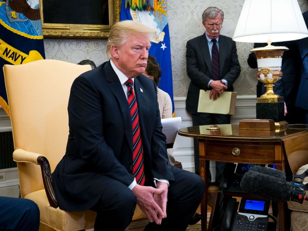 PHOTO: President Donald Trump's while meeting with President Moon Jae-in of South Korea in the Oval Office of the White House, May 22, 2018. In the background is National Security Adviser John Bolton.