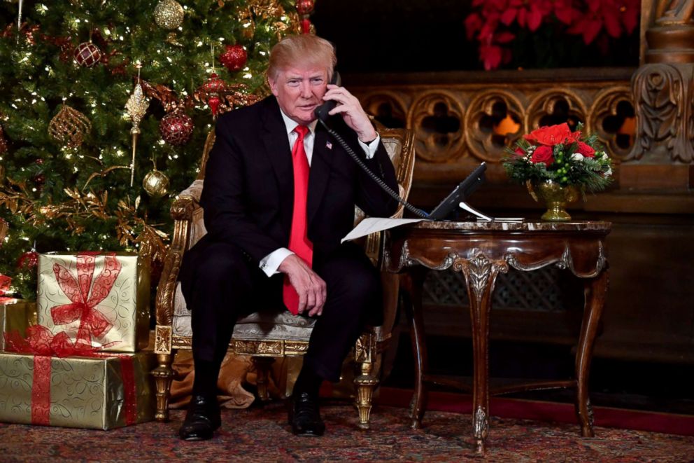 PHOTO: President Donald J. Trump participates in NORAD Santa Tracker phone calls at the Mar-a-Lago resort in Palm Beach, Florida, Dec. 24, 2017. 