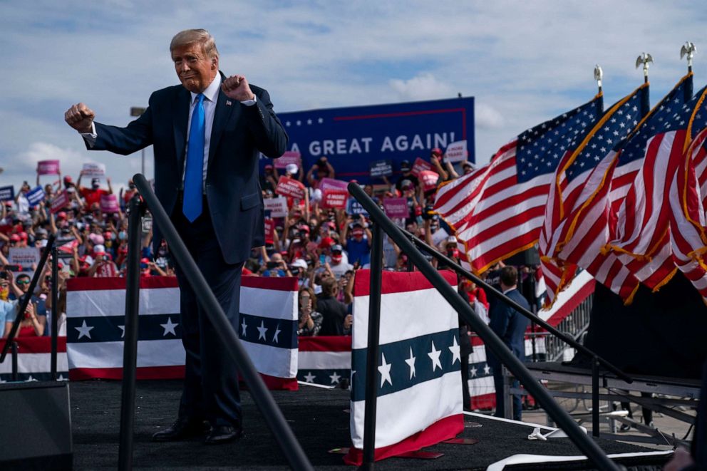 PHOTO: President Donald Trump dances as he walks off stage during a campaign rally at Pitt-Greenville Airport, Oct. 15, 2020, in Greenville, N.C.