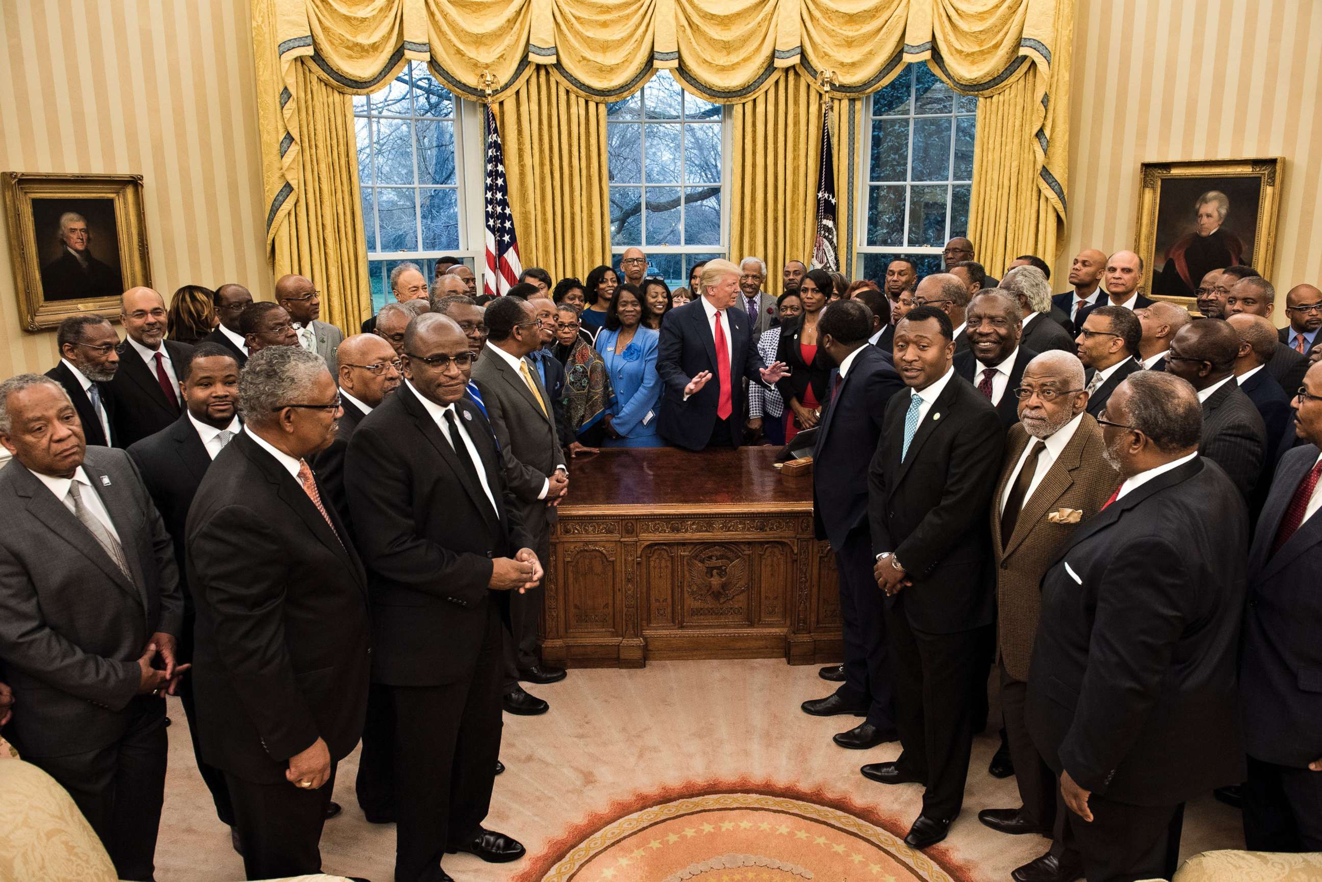 PHOTO: Omarosa Manigault (center R), President Donald Trump and leaders of historically black universities and colleges wait for a group photo in the Oval Office of the White House in Washington, D.C., Feb. 27, 2017.